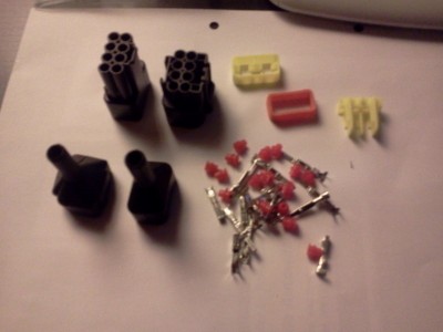 wasserdichter Stecker um Motorhinterrad und Controller zu verbinden - netterweise ohne namen(google) anleitung zum zusammenbau bekommen :-( ideen nach vorn